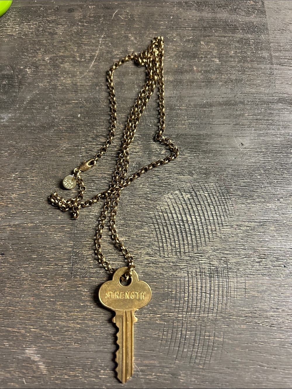Brass Tone 'Strength' Key Pendant Necklace - The Giving Keys